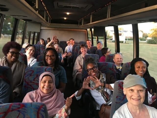 A Tour of Possibilities group photo in bus