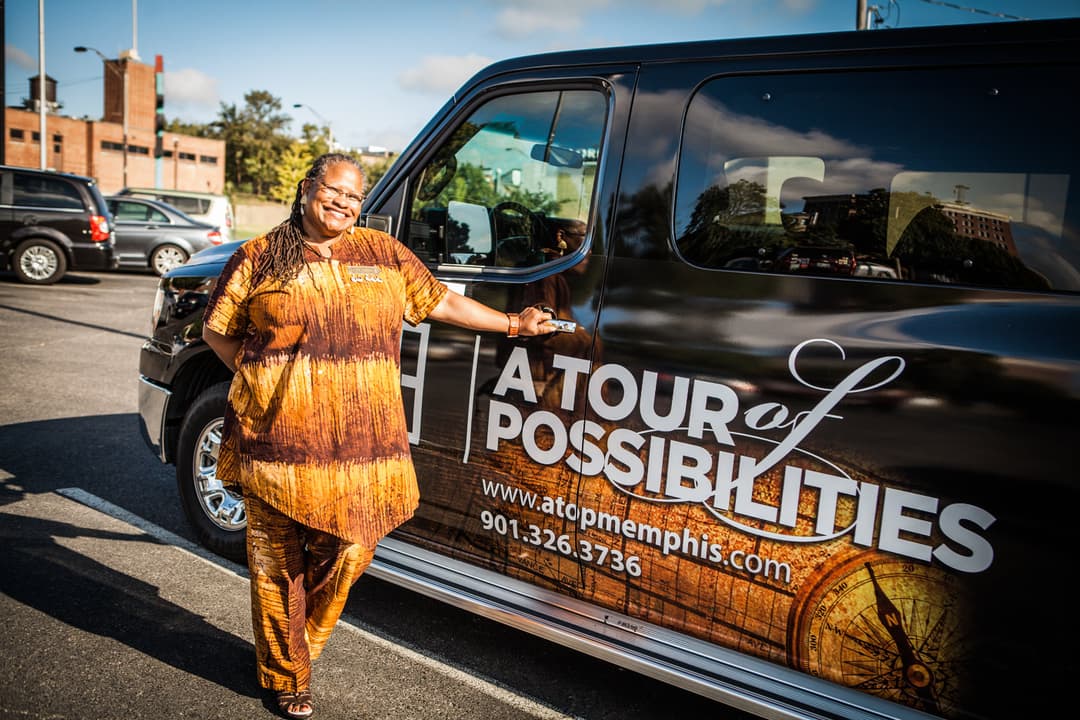 Owner Carolyn with A Tour Of Possibiliies bus