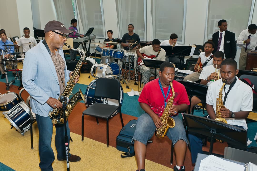Group playing instruments together.